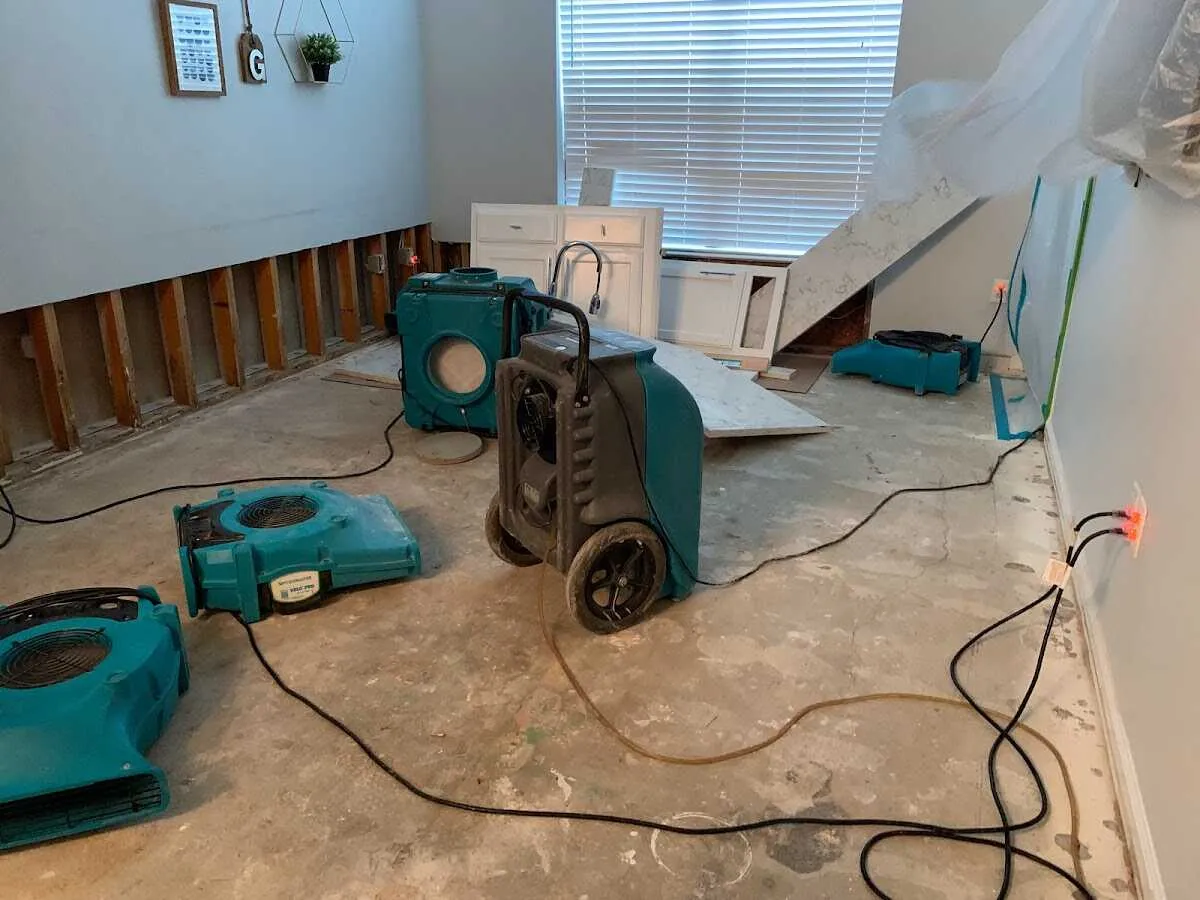 Dehumidifier in flood-cut room for Water Damage Restoration in Maynard